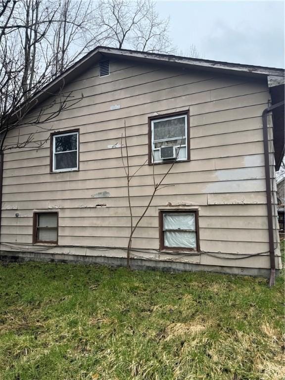 5125 Deliverance Ave, Williamson, NY 14505 - view of side of home featuring cooling unit