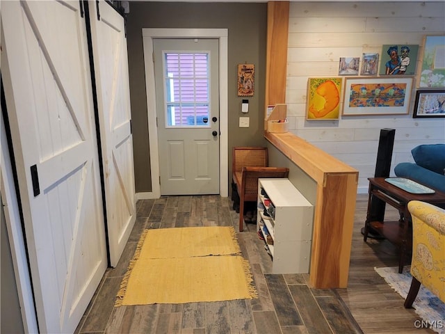165 Howe St, Le Ray, NY 13612 - doorway to outside featuring dark wood-style floors