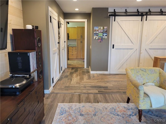 165 Howe St, Le Ray, NY 13612 - bedroom featuring baseboards, wood finished floors, and recessed lighting
