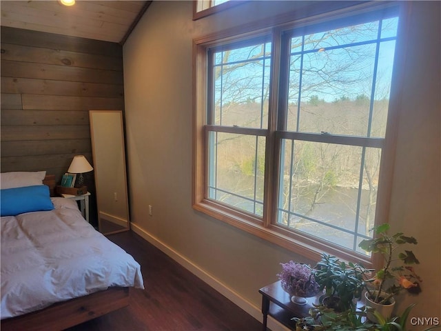 165 Howe St, Le Ray, NY 13612 - bedroom featuring baseboards, dark wood-type flooring, multiple windows, lofted ceiling, and wooden ceiling