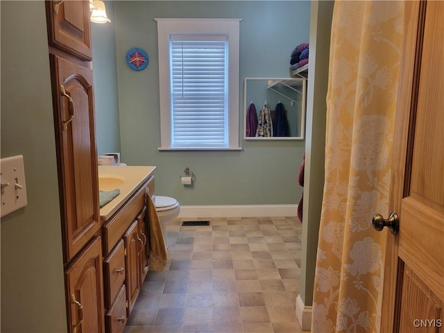 165 Howe St, Le Ray, NY 13612 - bathroom with vanity, baseboards, and toilet