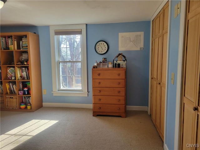 165 Howe St, Le Ray, NY 13612 - sitting room featuring light colored carpet, healthy amount of natural light, and baseboards