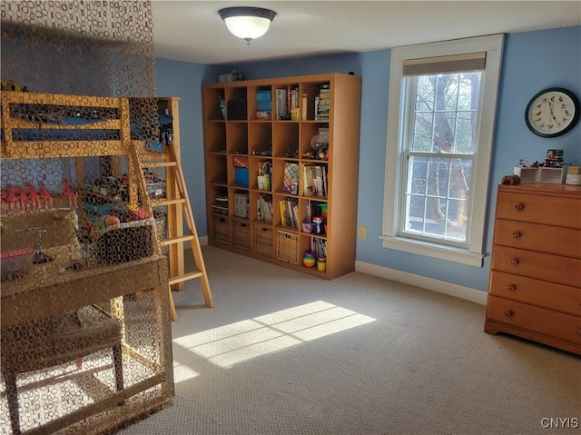 165 Howe St, Le Ray, NY 13612 - carpeted bedroom featuring multiple windows and baseboards