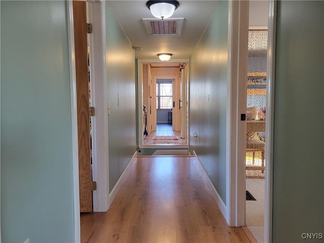 165 Howe St, Le Ray, NY 13612 - corridor with wood finished floors and baseboards