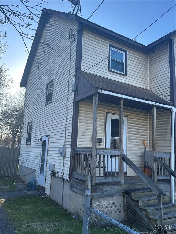 918 Midland Ave, Syracuse, NY 13205 - view of front facade with covered porch and fence