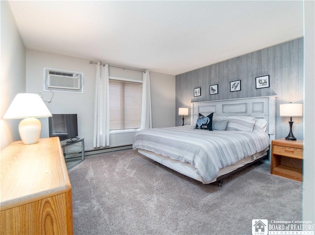 carpeted bedroom with a wall mounted AC and a baseboard heating unit