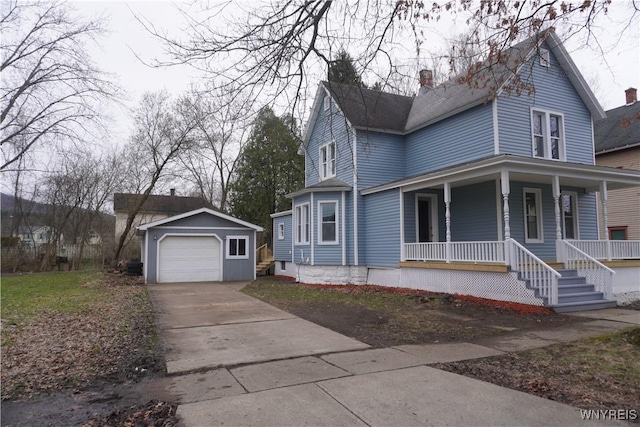705 Irving St, Olean-City, NY 14760 - view of front of property featuring an outbuilding, a detached garage, a porch, a chimney, and concrete driveway