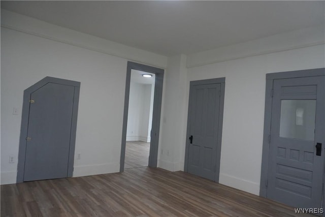 705 Irving St, Olean-City, NY 14760 - unfurnished room featuring baseboards and wood finished floors