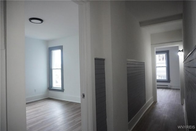 705 Irving St, Olean-City, NY 14760 - hallway featuring wood finished floors, baseboards, and baseboard heating