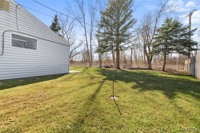 view of yard with fence