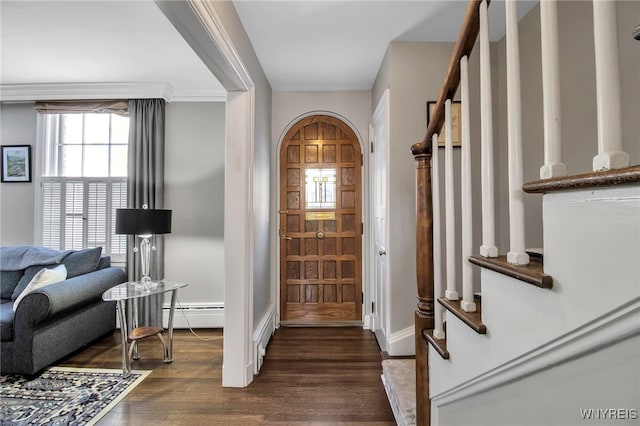 foyer with stairs, dark wood-style floors, a baseboard radiator, and baseboards