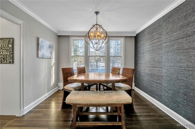 dining area featuring a chandelier, an accent wall, baseboards, and dark wood-style flooring