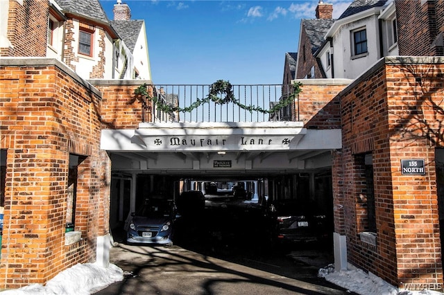 exterior space with a carport