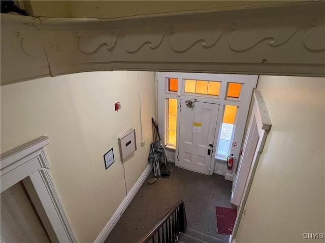 interior space featuring baseboards