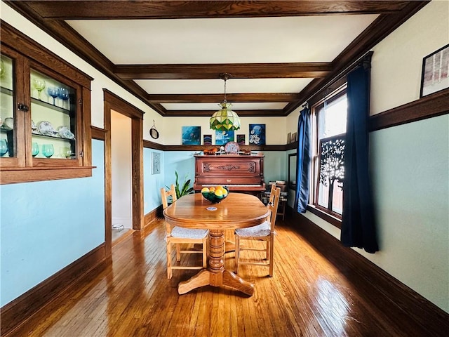 930 W 1st St, Elmira, NY 14905 - dining space with hardwood / wood-style floors, baseboards, and beam ceiling