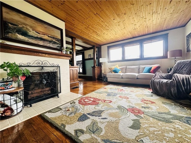 930 W 1st St, Elmira, NY 14905 - living area with hardwood / wood-style floors, wood ceiling, lofted ceiling, and a fireplace