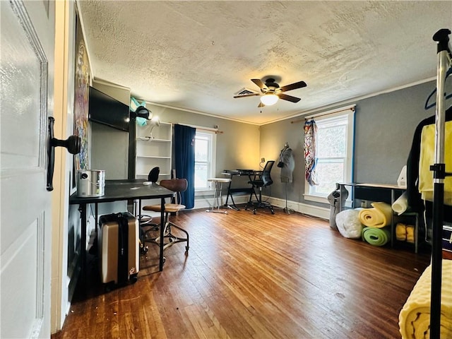 930 W 1st St, Elmira, NY 14905 - home office with hardwood / wood-style floors, a ceiling fan, a textured ceiling, and crown molding