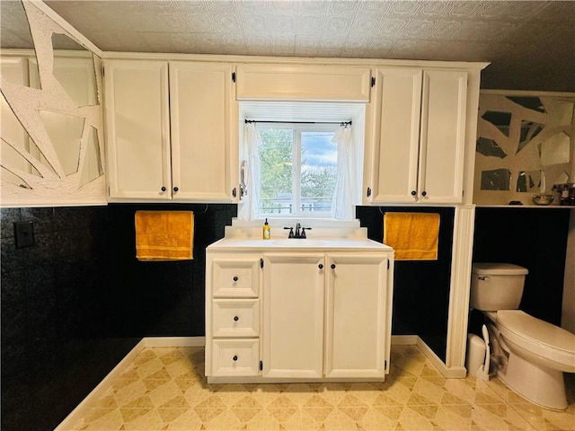 930 W 1st St, Elmira, NY 14905 - clothes washing area featuring baseboards and a sink