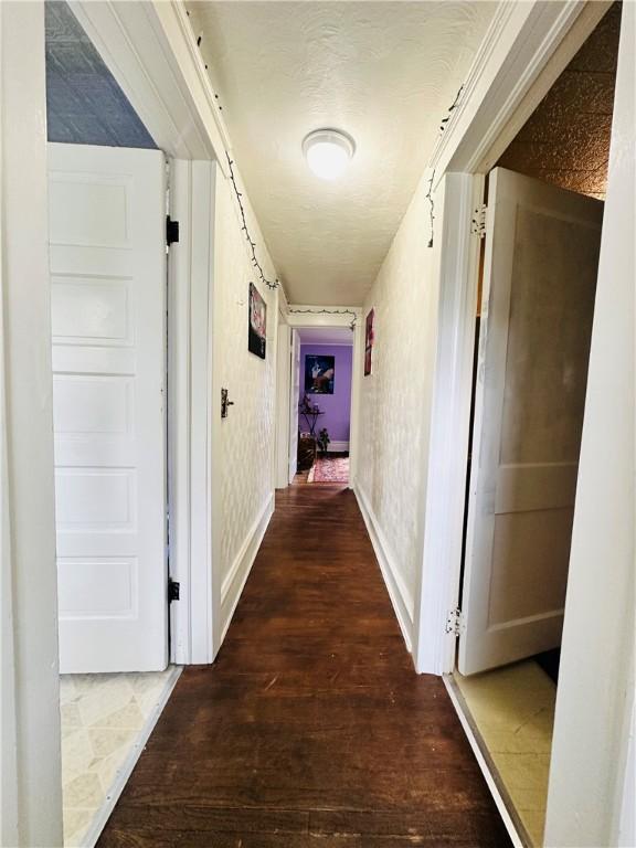 930 W 1st St, Elmira, NY 14905 - hallway with wood finished floors
