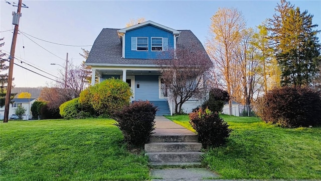 930 W 1st St, Elmira, NY 14905 - view of front of property with covered porch and roof with shingles