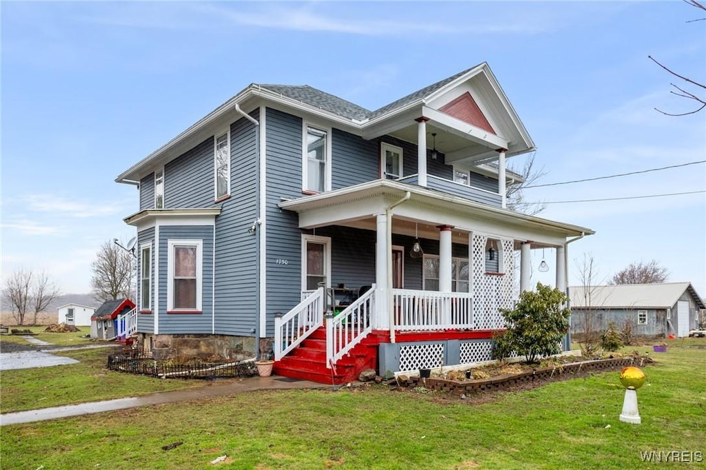 1750 Kent Rd, Carlton, NY 14477 - traditional home with a front lawn and covered porch