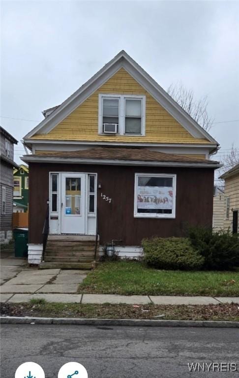 1257 Kensington Ave, Buffalo, NY 14215 - bungalow-style house featuring cooling unit and entry steps