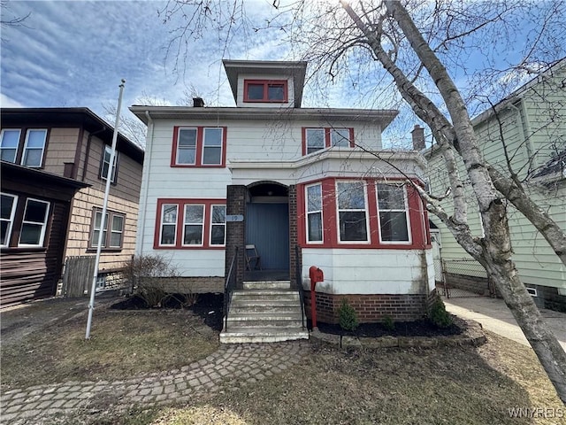 view of american foursquare style home