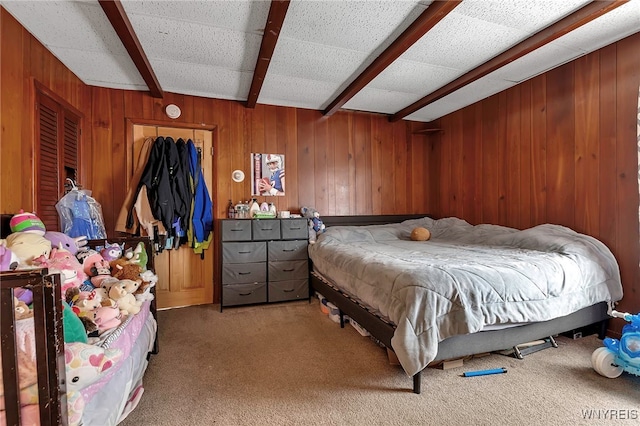 192 Pine St, Lockport City, NY 14094 - carpeted bedroom featuring wooden walls and beamed ceiling