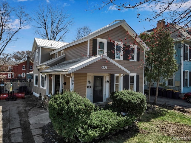 192 Pine St, Lockport City, NY 14094 - view of front of home with metal roof and fence