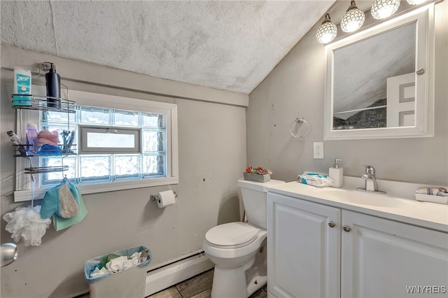 192 Pine St, Lockport City, NY 14094 - bathroom featuring toilet, a textured ceiling, vanity, vaulted ceiling, and a baseboard heating unit