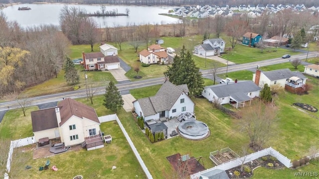 aerial view with a residential view and a water view