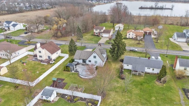 aerial view with a water view and a residential view