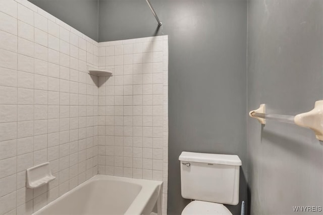 full bathroom with toilet and bathtub / shower combination