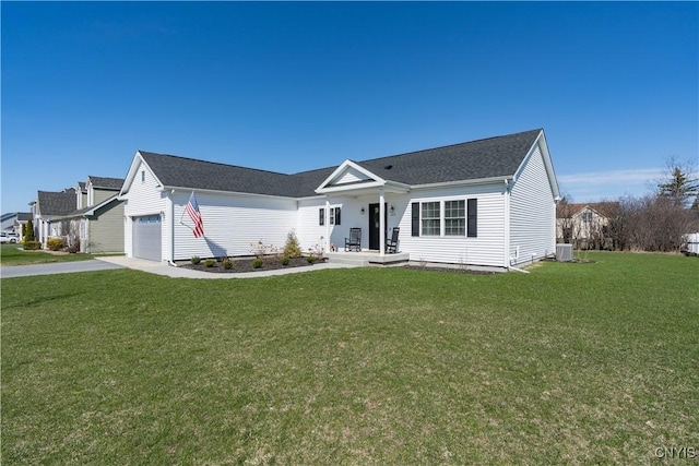 ranch-style home with a front yard, an attached garage, central AC unit, and concrete driveway
