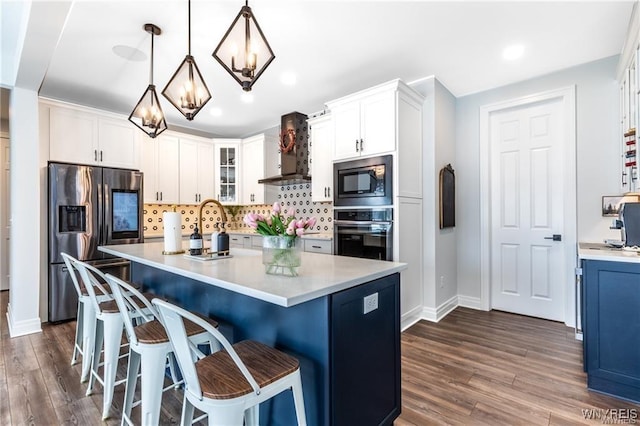 kitchen with oven, stainless steel fridge, wall chimney exhaust hood, built in microwave, and dark wood-style flooring