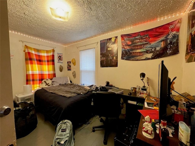 bedroom featuring a textured ceiling