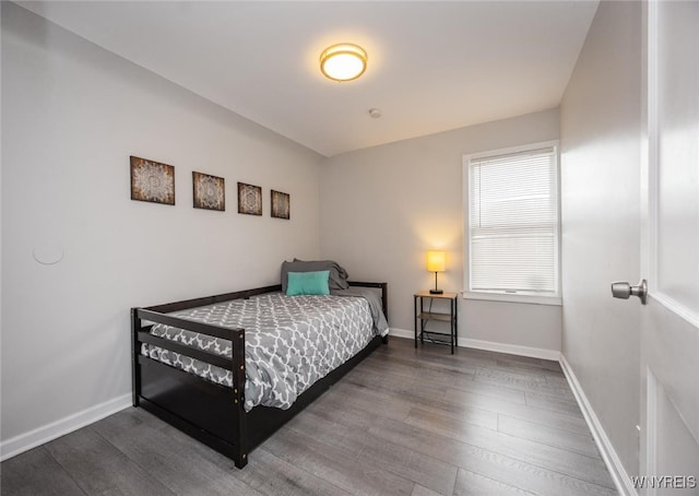 523 76th St, Niagara Falls, NY 14304 - bedroom featuring baseboards and wood finished floors
