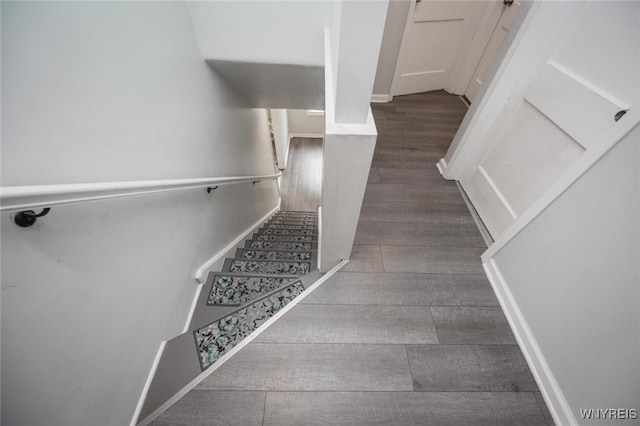523 76th St, Niagara Falls, NY 14304 - stairs featuring wood finished floors