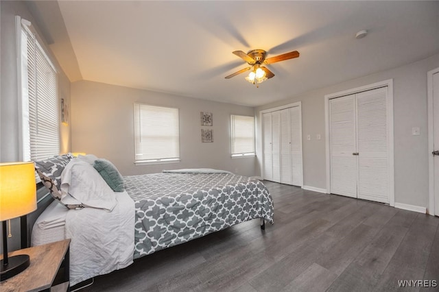 523 76th St, Niagara Falls, NY 14304 - bedroom with ceiling fan, multiple closets, baseboards, and wood finished floors