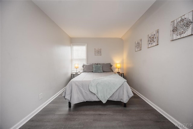 523 76th St, Niagara Falls, NY 14304 - bedroom featuring baseboards and wood finished floors