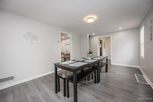 523 76th St, Niagara Falls, NY 14304 - dining room featuring visible vents, recessed lighting, dark wood-style flooring, and baseboards