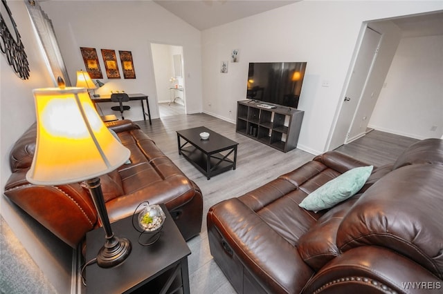523 76th St, Niagara Falls, NY 14304 - living area with baseboards, wood finished floors, and lofted ceiling