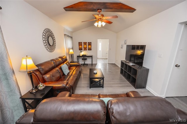 523 76th St, Niagara Falls, NY 14304 - living room with a ceiling fan, baseboards, vaulted ceiling with beams, and wood finished floors