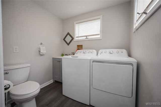 523 76th St, Niagara Falls, NY 14304 - clothes washing area featuring dark wood-style flooring, laundry area, washing machine and dryer, and baseboards