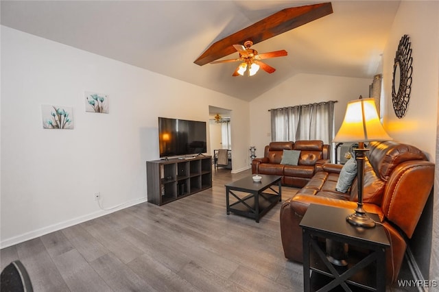 523 76th St, Niagara Falls, NY 14304 - living room featuring a ceiling fan, baseboards, lofted ceiling with beams, and wood finished floors