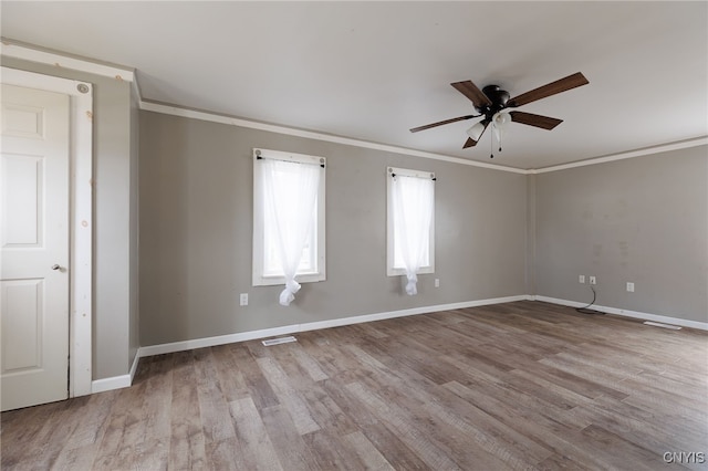 15-17A Vincent St, Champion, NY 13619 - unfurnished room featuring visible vents, baseboards, ceiling fan, crown molding, and wood finished floors