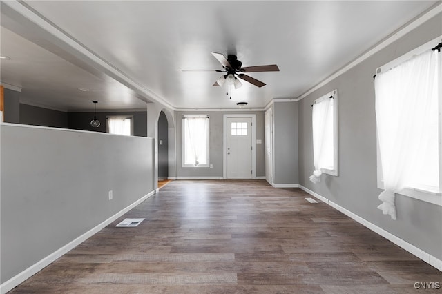 15-17A Vincent St, Champion, NY 13619 - entryway with baseboards, ornamental molding, a ceiling fan, visible vents, and arched walkways
