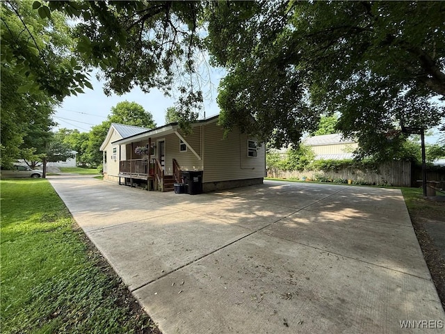42 Mechanic St, Collins, NY 14070 - view of home's exterior with driveway, crawl space, and a metal roof