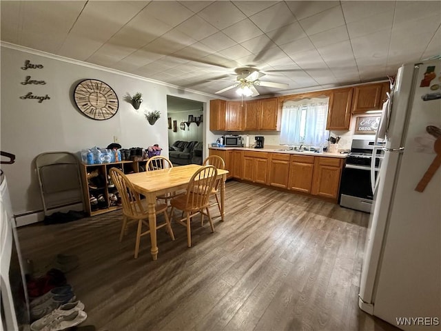 42 Mechanic St, Collins, NY 14070 - dining area with crown molding, wood finished floors, and ceiling fan