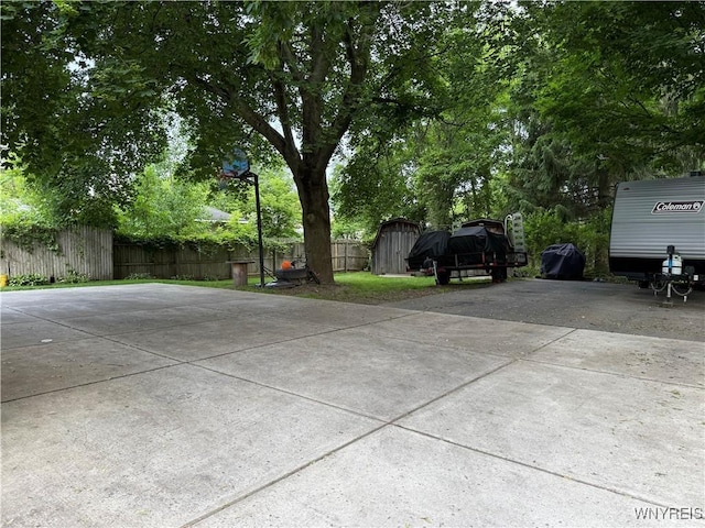 42 Mechanic St, Collins, NY 14070 - exterior space with a storage unit, a fenced backyard, and driveway
